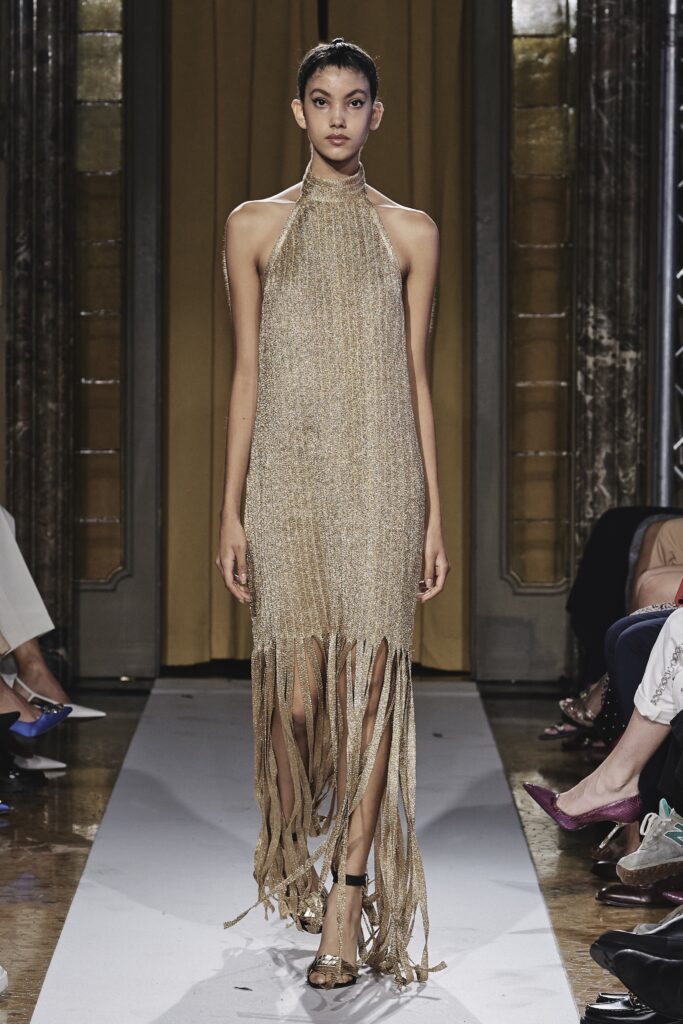 LE LAM Eternity golden halter gown on the Milan runway